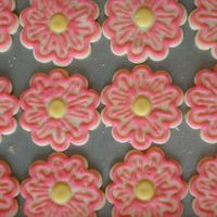 Daisies I made these cookies to match flowers on a cake that was for a surprise birthday party.