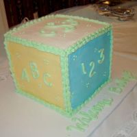 Baby Block Eight layers with buttercream filling. For a friend's baby shower. Baby's initials on top. Colors matched invitation.