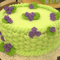 Green Basketweave Cake W/violets I made this cake at a demo for my store. One just like it was featured on the cover of our class catalog, so I reproduced it at the demo....