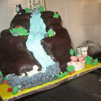 1St Birthday Cake Four layers of lemon and vanilla cake with buttercream icing