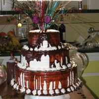 40Th Birthday Cake I made this cake for a friends birthday. It was fun...Baking was time consuming. Its double stacked 6 inch, 9 inch, 12 inch. Chocolate w/...