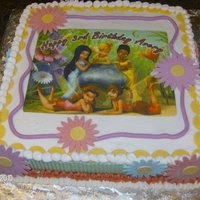 Granddaughters Birthday! Tinkerbell The cake is from Sharon Zambito DVD sheet cake secrets. And the recipe is Doc cake, and chocolate. Everything is edible.