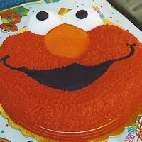 Elmo Wilton pan, #16 tip for the face. I smoothed out the eyes nose and mouth. Very difficult for the first time.