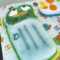 Ocsar The Grouch I did not think this cake would turn out but it turned out to be my favorite of the 4 cakes. I used tip 48 for his face, hands and the...