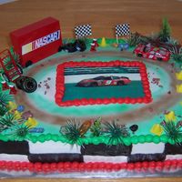 Nascar Theme This cake was a project! My customer wanted a picture of Kasey Khane's car which I can d obut the local cake store that has the edible...