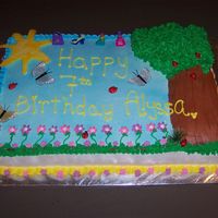 A Day At The Park This was a full sheet cake. The tree trunk is the cut off part of the cake(The hump), under the green leaves are mini cupcakes and the sun...