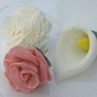Fondant Rose, Carnation And Calla Lilly First time making all three flowers using fondant and/or gumpaste.