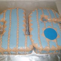 Teenage Boy's 16Th Bday Party this is (4) 9x13's carved nto the numbers and then coated in buttercream. topped and deco'd with fondant.