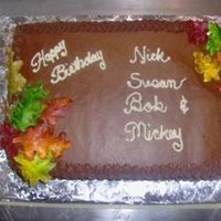 Fall Birthdays Chocolate ganache covered cake with handpainted sugarpaste fall leaves