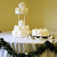 Martie's Cake petal shaped cakes in various flavors with buttercream and mmf and mmf swags oor drapes, a ton of sugar roses and apple blossoms, and the &...
