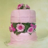 Mish's40Th Surprise Lightly marbled pink fondant with sugarpaste roses and pink ribbons,