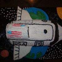 To Infinity...... This was my first attempt of a shaped cake. It's a rocket.