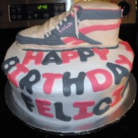 Reebok Shoe This is the cake I did for my daughter's 6th birthday. Her favorite shoe! Yellow cake, buttercream, and mmf
