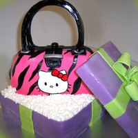 Hello Kitty Birthday cake for my niece's 15th. Everything covered in fondant, lid made of foam