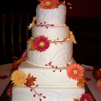Gerber Daisy Wedding Cake This cake was for my sister who was married 5 hours away so i had to travel with it in pieces and assemble when we got there. covered in...