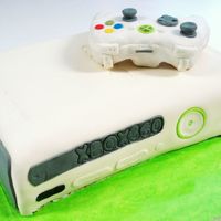 Xbox 360 Cake Grooms Cake-- all fondant. The controller we made out of rice crispy treats. My brother has a real Xbox 360-he lent it to us so we could...