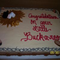 Western Baby Shower Hot glued the hat on baby, put him on the "hay", barbed wire done in bc.
