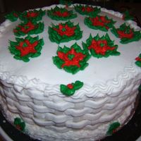 Christmas All buttercream, the sides are basketweave with poinsettas made from buttercream on the top