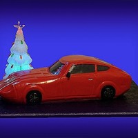 Car Cake: 1970 Datsun 240Z This is my first car cake, for a car clubs' Christmas party; it is 24" . After completeing this I bow down to all those before me...