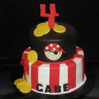 Pirate This was a take on one of Sharon's awesome cakes, but instead of the skulls, they wanted something more kiddy pirate, so this is what...