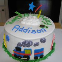 Transportation!! Planes, trains, and automobiles! Iced in buttercream with fondant decorations, for a little three year old.