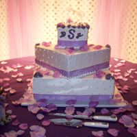Britani'swedding Boy is it difficult to photograph wedding cakes! This was my first big cake to do...for 150 people. The tiers were 18, 12 and 6 inches with...