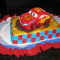 Cars Cake I'm not really happy with the cake, but it is practice...the fondant is not smooth like I wanted.