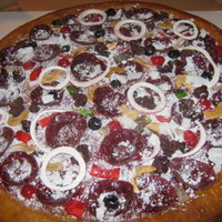 Pizza Cake 16" confetti cake with light milk chocolate butter cream cheese frosting. fondant pepperonies, mushrooms, red onions, melted red and...