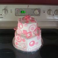 Modern Cake Buttercream with fondant accents. Used floral wire and beads from the craft department.
