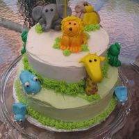 Img_1833.jpg For my son's first birthday. Egg-free chocolate cake with hand moulded MMF animals.