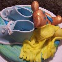 Baby Boy My first time making fondant baby shoes and bear.