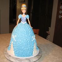 Cinderella Cake I used a regular full size Barbie. Baked the cake in an 8 cup glass measuring cup and also needed an 8 in round layer. I sliced the dress...