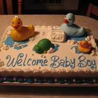 Bathtub Toys This cake was done using a vanilla sheet cake and buttercream icing. Used blue for the water and white for the bubbles. Used a small slice...