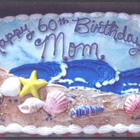 Beach Theme I did the decorated this cake with buttercream icing..... layering the colors ( swirl the blue for the sky, then the darker blue for the...