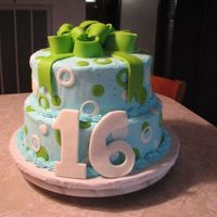 Bow And Dots 16 This stacked cake was done for a Sweet 16 party. Used MMF to do the bow , dots and the 16 that's just leaning on the cake. It was iced...