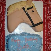 Horse Head Horse head made from cake and carved into shape. Bottom is some kind of handkerchief type thingy cause they needed more cake.