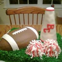 Burns Cowboys Banquet 1/4 sheet base football and megaphone shaped from rice krispies then covered w/ fondant.