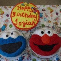 Elmo And The Cookie Monster Made this cake for my stepsons' son.