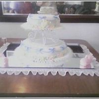 Baby Shower Sorry it looks a little blurry! This one I did for a baby shower. It turned out really good... Fun to make the little clothes. Yellow cake...