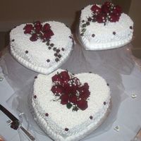 Pearls N Lace Heart shaped cakes with lace and roses.