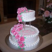 Sharon's Birthday Heart shape for top tier, round for bottom with cascading carnations.