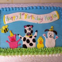 Barnyard Birthday Buttercream icing with fondant animals that were made days before.