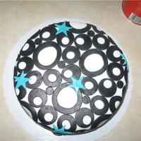 Jessica's Birthday Cake I loved the mix of the teal with the black and white. Buttercream icing with fondant decorataions.