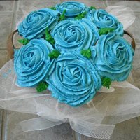 Cupcake Rose Bouquet I made these for an elderly ladies bday party at a nursing home. They are filled with raspberry cream at their request. They were a BIG hit...