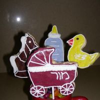 Baby Cookie Bouquet cookies are coated with RBC and royal icing accents