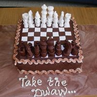 Chess Set 1 Chess set cake made for a chess lover. Yellow cake with chocolate BC and fondant pieces. I was freaking out because the pieces were being...