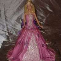 Dsc01315.jpg another one of my doll cakes done for a little girls 5th birthday