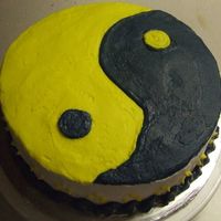 Navy/yellow Yin Yang Inspired by other cakes here, it's a white cake with buttercream icing. Yellow and Navy Blue Yin Yang.