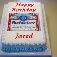 Bud Birthday Cake Logo is made with an edible image, message made with candy melts. Iced in buttercream