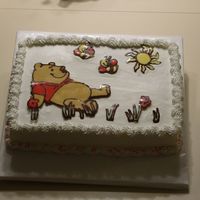Winnie The Pooh Choc Transfer Practice cake iced in buttercream with my first attempt at chocolate transfer!